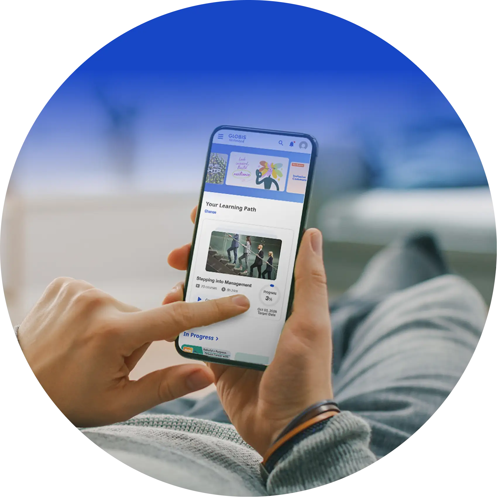 Close-up of a person selecting a course on the e-learning app using a smartphone.
