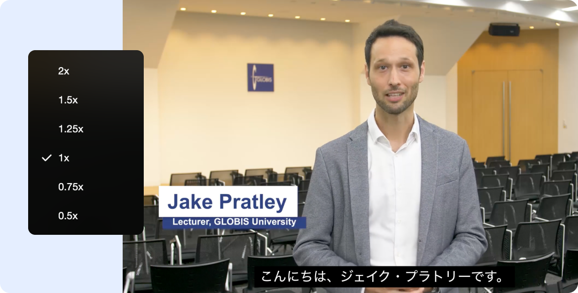 Video lesson featuring GLOBIS lecturer Jake Pratley with Japanese subtitles and a playback speed menu.